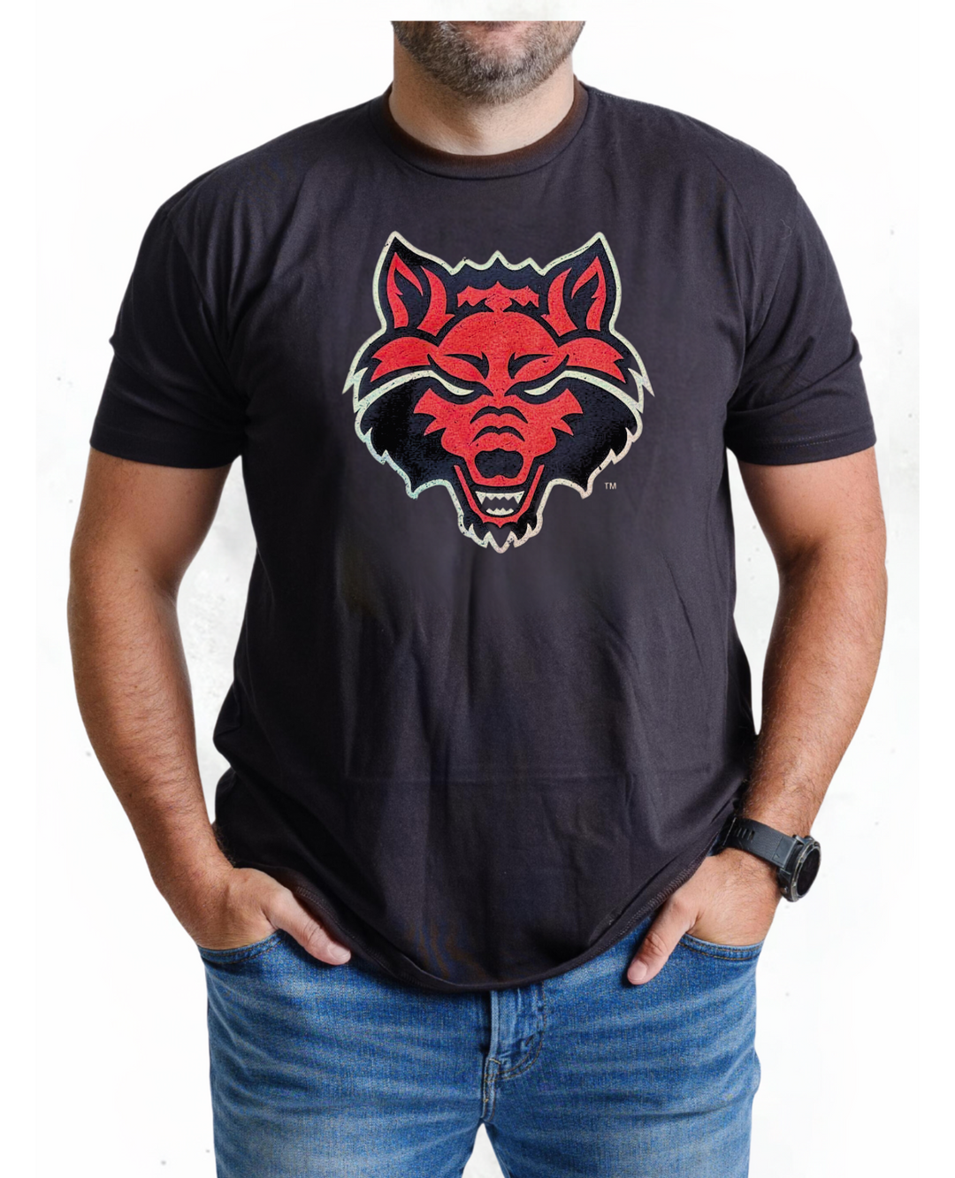 Nudge Printing model wearing an Arkansas State black t-shirt with the Red Wolf logo printed on the chest