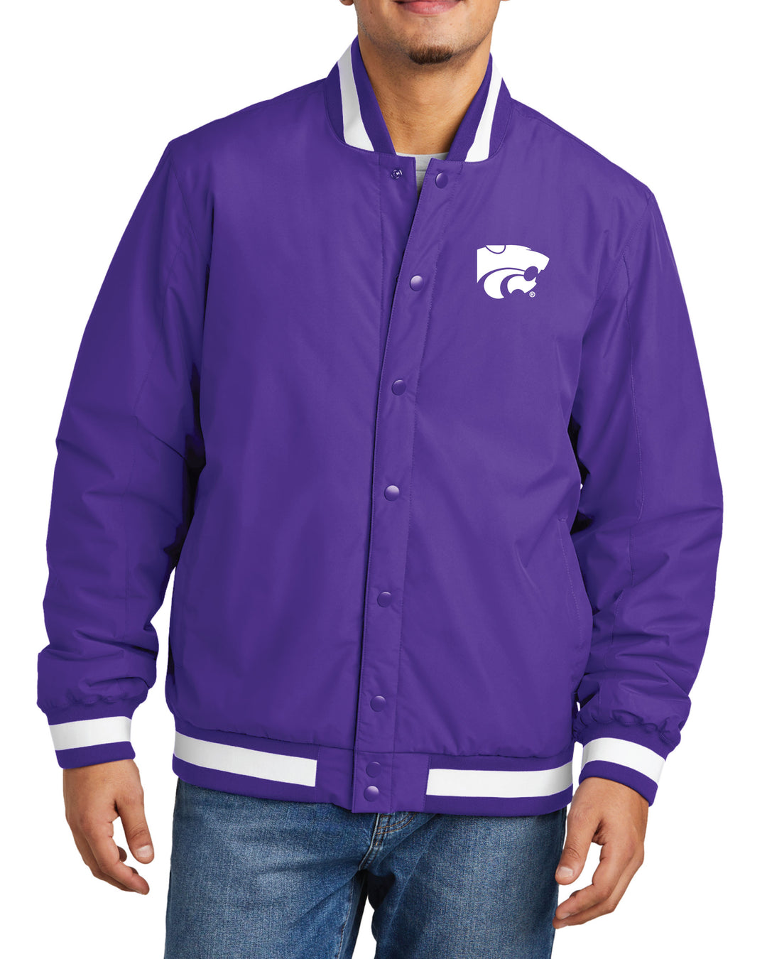 Man wearing a purple Kansas State varsity jacket with white Powercat logo embroidered on the left chest.