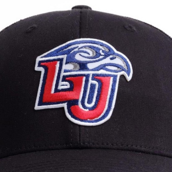 Close up picture of a Liberty University black hat with the LU logo on the front