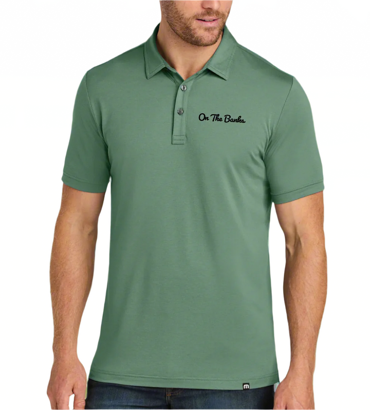 "On the Banks" Travis Mathew Glenview Solid Green Polo