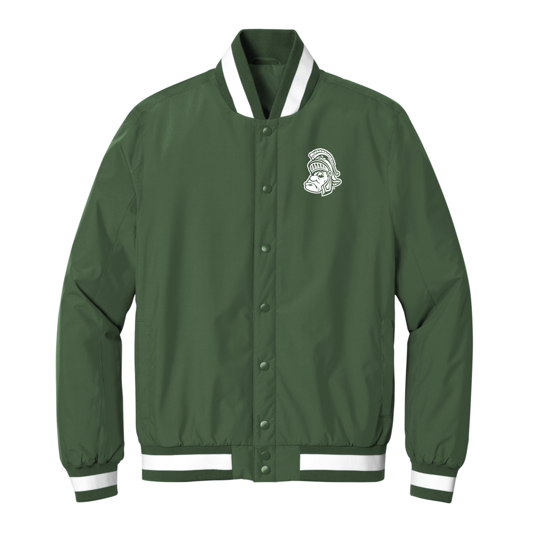 Front view of a green Michigan State varsity jacket with the Gruff Sparty logo embroidered in white thread on the left chest