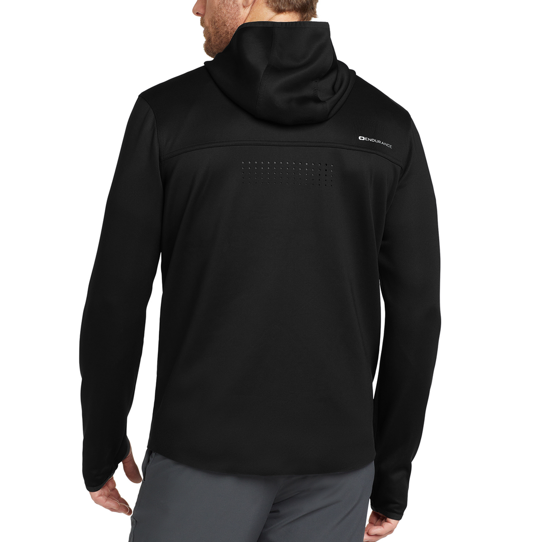 Back view of a male model wearing a black performance OGIO Stealth jacket