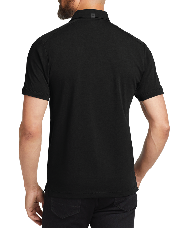 Back view of a black OGIO polo being worn by a male