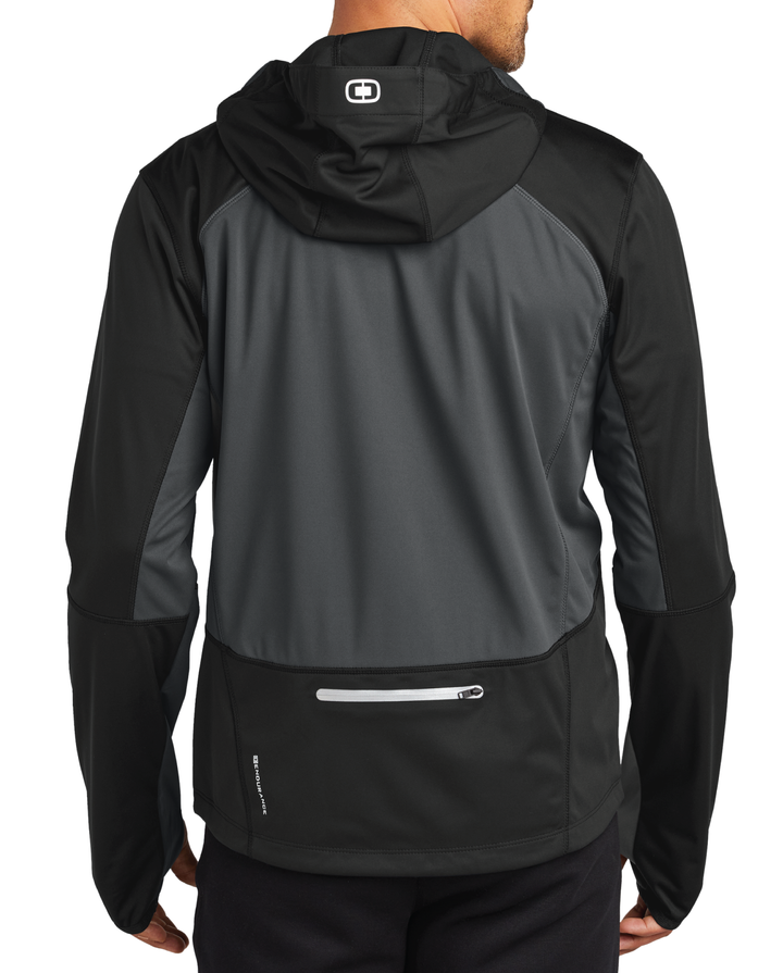 Back view of an OGIO performance soft shell jacket worn by a male model