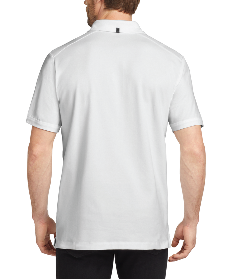 Back view of a model wearing a white OGIO Limit Polo sold by Nudge Printing