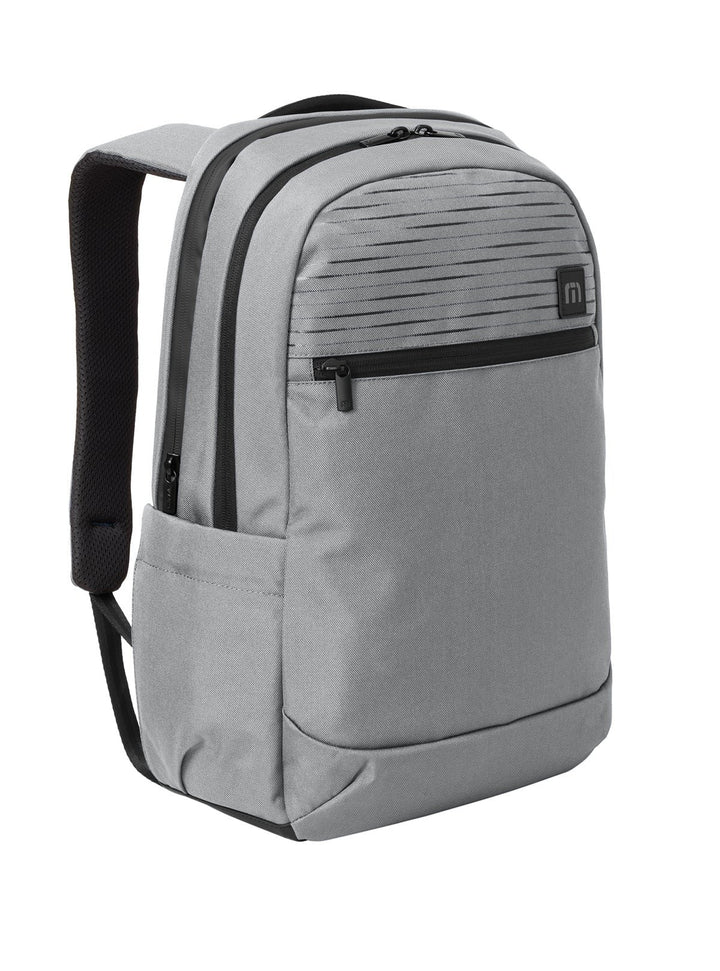 Front angled view of a grey Travis Mathew approach backpack from Nudge Printing